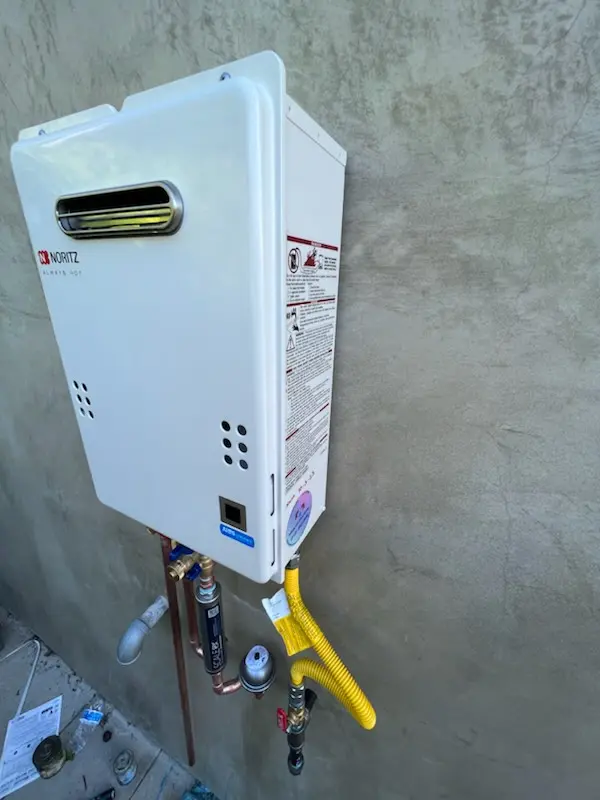Tankless water heater installation for Lee School homes